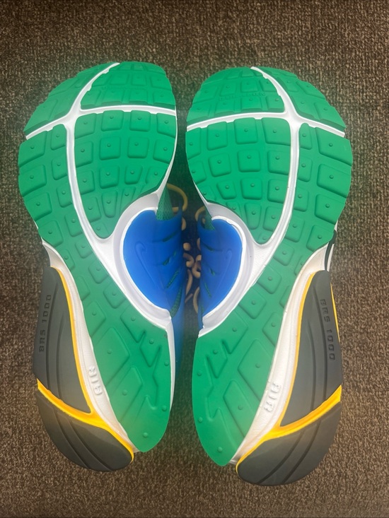 Nike Kids Teal Mesh Sneakers with Bright Yellow Accents main image 4